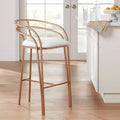 Tabouret de bar Tanner en métal doré, hauteur 76 cm, avec coussin rembourré en tissu blanc moderne, dossier bas et repose-pieds, idéal pour îlot de cuisine de hauteur standard.
